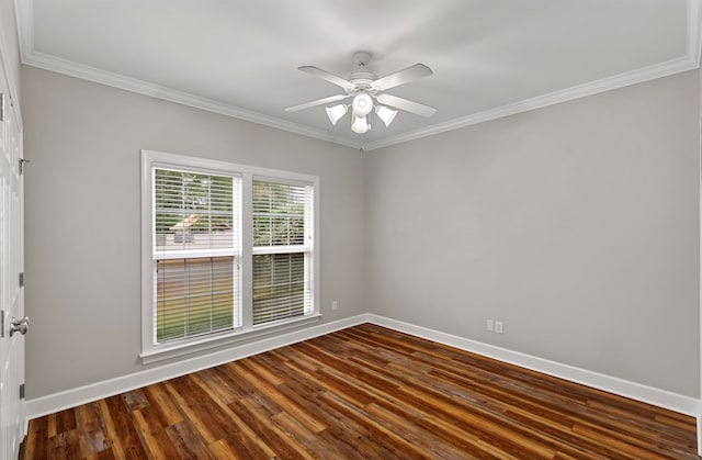 empty room featuring hardwood / wood-style flooring, ceiling fan, and ornamental molding