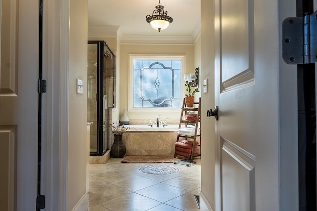 entryway featuring light tile patterned floors and ornamental molding