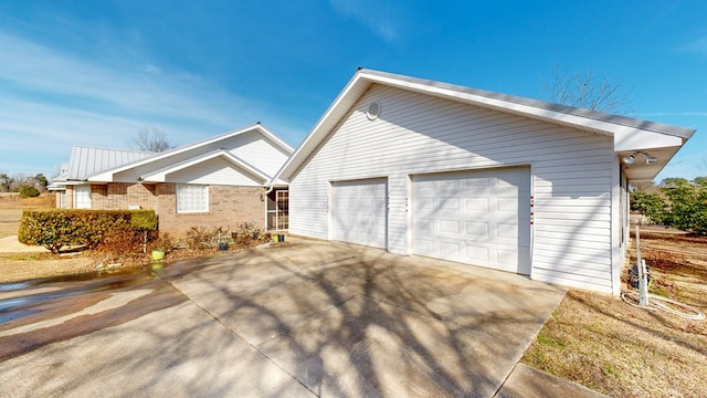 view of home's exterior featuring a garage