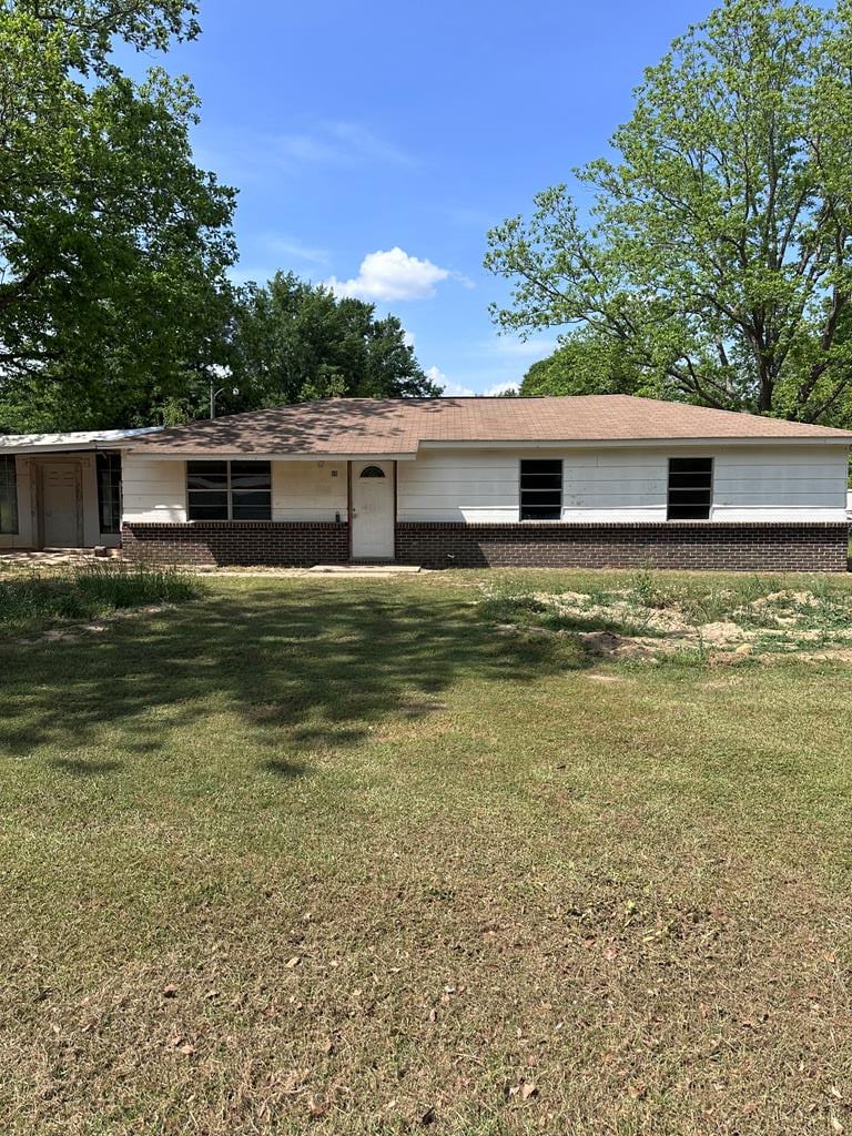 85 Fawn Dr, Webb, AL 36376 - view of front of house with a front yard and brick siding