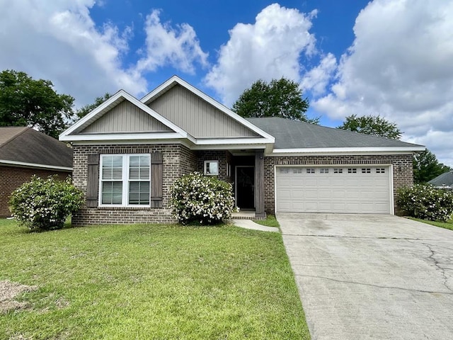 114 Brattleboro Ct, Dothan, AL 36301 - view of front of property featuring brick siding, a garage, concrete driveway, and a front lawn