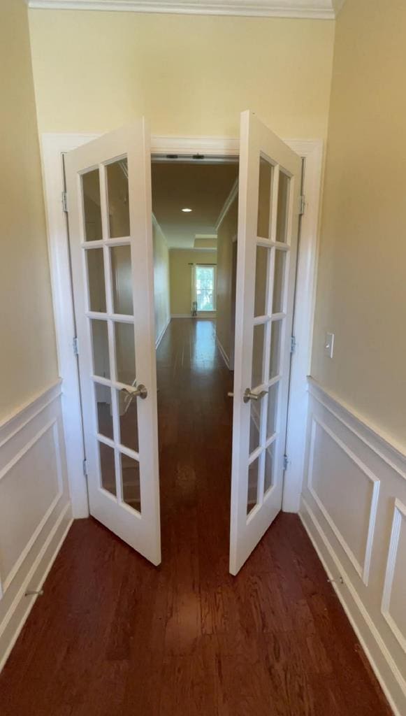 114 Brattleboro Ct, Dothan, AL 36301 - entryway with french doors, a decorative wall, a wainscoted wall, dark wood finished floors, and ornamental molding