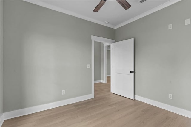 195 County Road 711, Enterprise, AL 36330 - empty room featuring a ceiling fan, wood finished floors, ornamental molding, baseboards, and a smoke detector