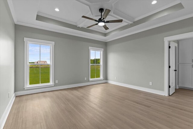 195 County Road 711, Enterprise, AL 36330 - unfurnished room featuring healthy amount of natural light, coffered ceiling, ceiling fan, light wood finished floors, and crown molding
