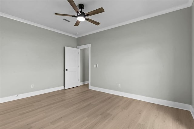 195 County Road 711, Enterprise, AL 36330 - unfurnished room with ceiling fan, crown molding, light wood-type flooring, and baseboards