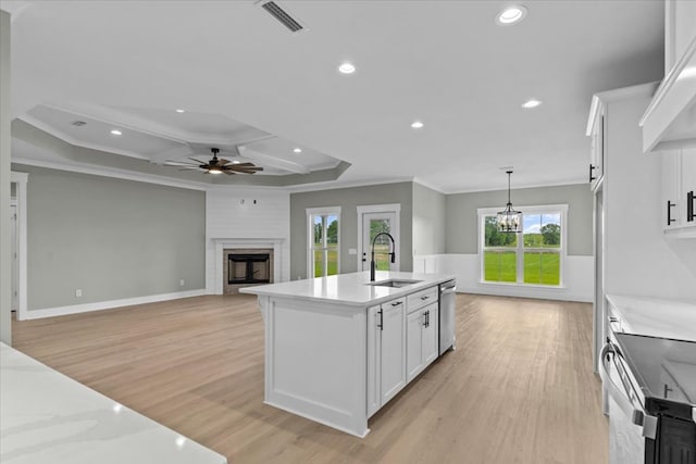 195 County Road 711, Enterprise, AL 36330 - kitchen with a sink, a ceiling fan, stainless steel appliances, light wood-type flooring, and crown molding