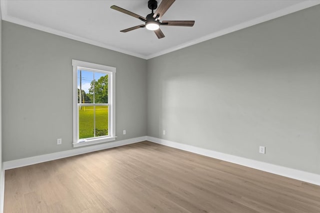 195 County Road 711, Enterprise, AL 36330 - empty room with wood finished floors, baseboards, crown molding, and ceiling fan