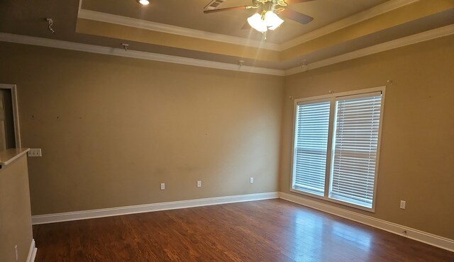103 Whaley Ct, Ashford, AL 36312 - empty room with a tray ceiling, wood finished floors, ceiling fan, and crown molding