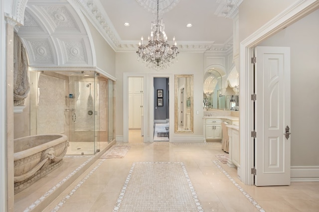 bathroom featuring tile patterned flooring, a notable chandelier, separate shower and tub, crown molding, and vanity