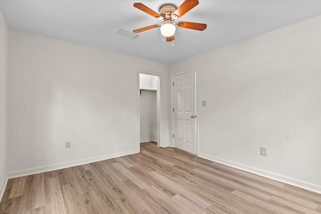 618 Langley Dr, Dothan, AL 36301 - unfurnished bedroom with light wood-style flooring, baseboards, a closet, and a ceiling fan