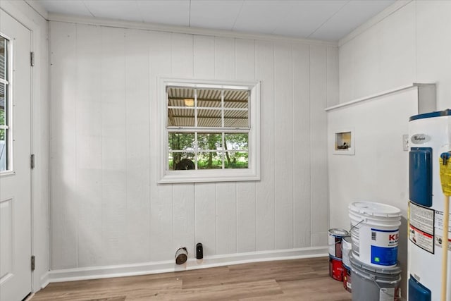 618 Langley Dr, Dothan, AL 36301 - laundry room with electric water heater, hookup for a washing machine, wood finished floors, and baseboards