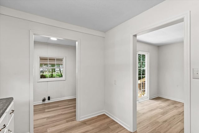 618 Langley Dr, Dothan, AL 36301 - unfurnished dining area with light wood finished floors and baseboards