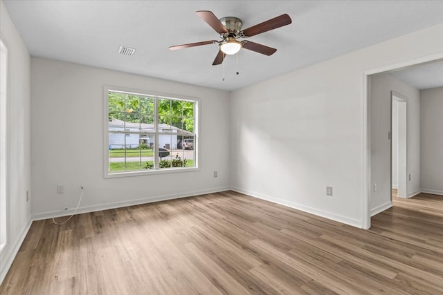 618 Langley Dr, Dothan, AL 36301 - spare room featuring light wood-style floors, baseboards, and ceiling fan