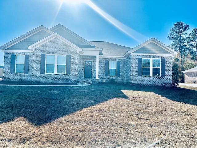 view of front facade with a front lawn