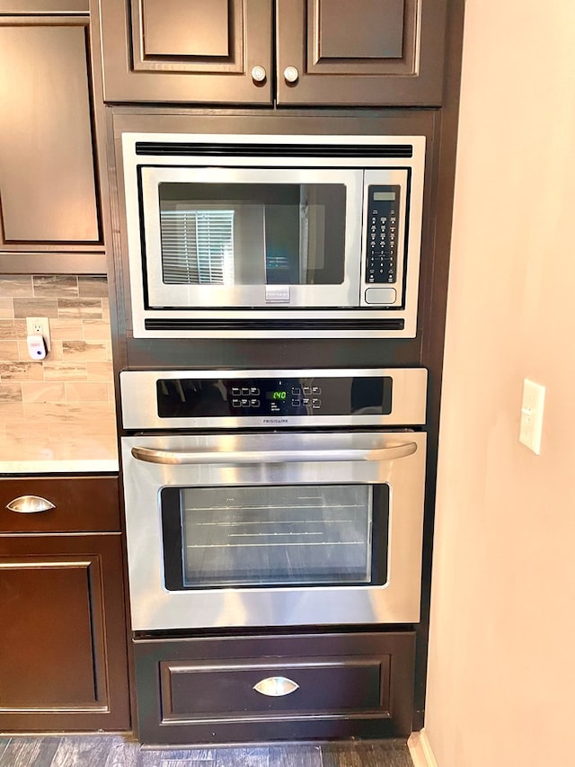 details featuring tasteful backsplash and stainless steel appliances