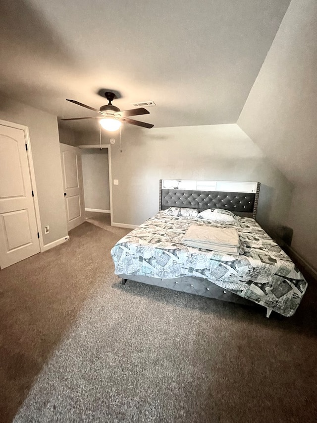 carpeted bedroom with visible vents, ceiling fan, lofted ceiling, and baseboards