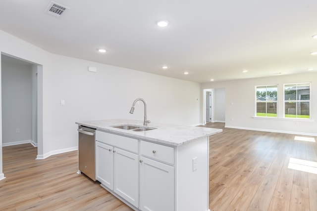 21 Popcorn Cir, Rehobeth, AL 36301 - kitchen featuring stainless steel dishwasher, light wood finished floors, a center island with sink, white cabinets, and recessed lighting
