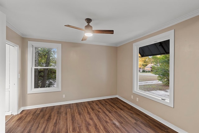 unfurnished room with dark hardwood / wood-style floors, ceiling fan, and crown molding