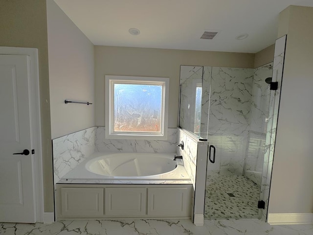 bathroom with independent shower and bath