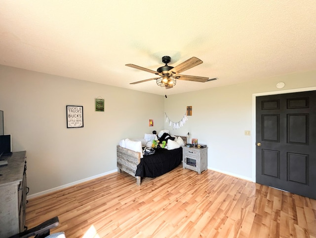 1370 Coach Rd, Slocomb, AL 36375 - bedroom featuring light wood-style flooring and ceiling fan