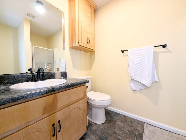 1370 Coach Rd, Slocomb, AL 36375 - full bathroom featuring vanity, a shower stall, and stone finish flooring