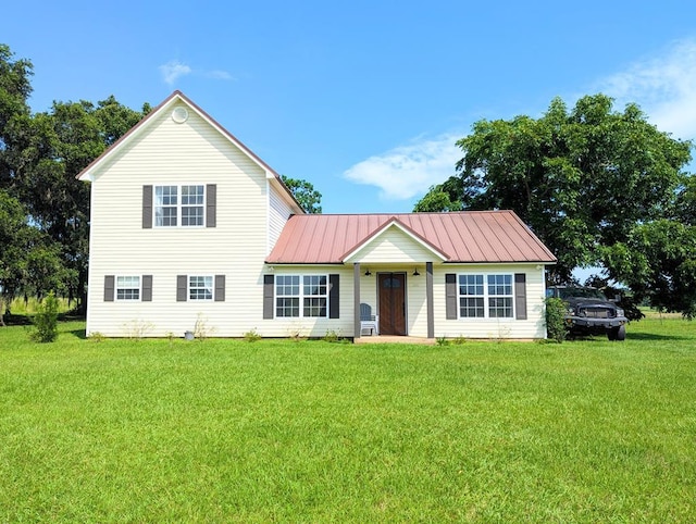 1370 Coach Rd, Slocomb, AL 36375 - view of front of property featuring a front yard and a metal roof