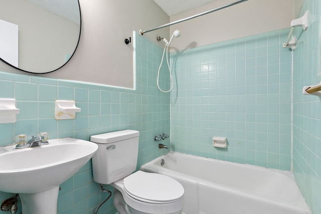 139 Merrydell Dr, Ozark, AL 36360 - full bathroom featuring shower / bathtub combination, tile walls, and a wainscoted wall