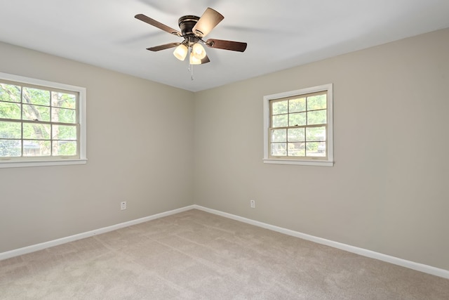 139 Merrydell Dr, Ozark, AL 36360 - spare room with light carpet, plenty of natural light, and a ceiling fan