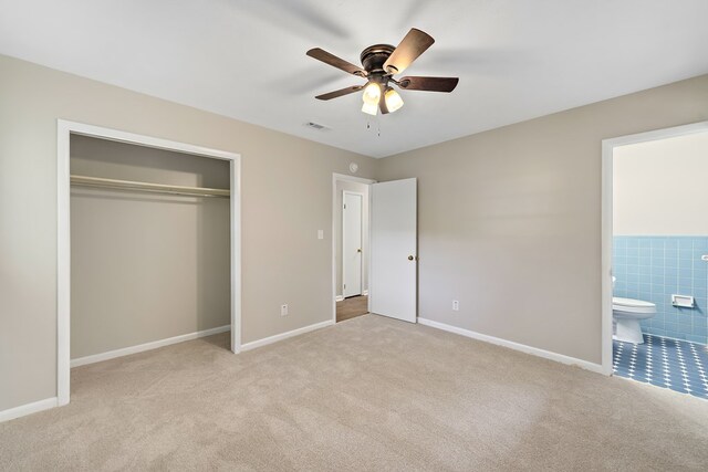139 Merrydell Dr, Ozark, AL 36360 - unfurnished bedroom featuring carpet floors, a closet, connected bathroom, and ceiling fan