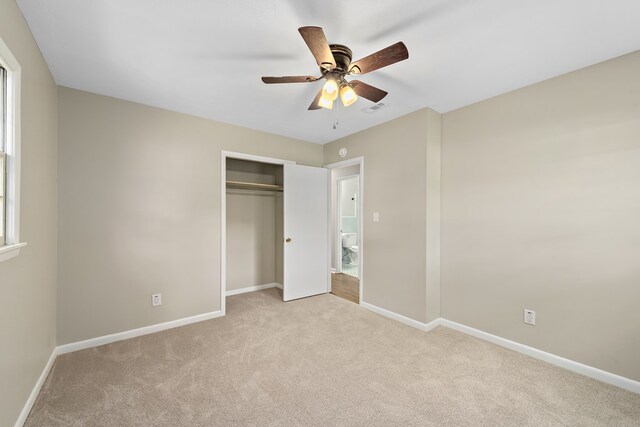 139 Merrydell Dr, Ozark, AL 36360 - unfurnished bedroom featuring carpet flooring, a closet, and ceiling fan