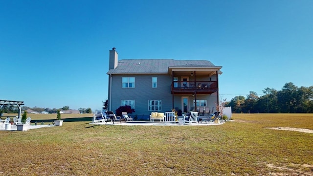 back of property featuring a lawn, an outdoor living space, a pergola, a balcony, and a patio area