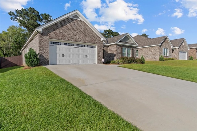 630 Ridgeland Rd, Dothan, AL 36301 - view of front of property with a garage, concrete driveway, and brick siding