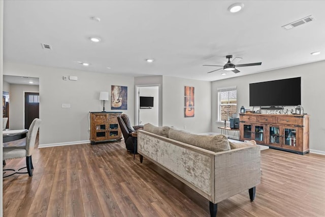 630 Ridgeland Rd, Dothan, AL 36301 - living room featuring wood finished floors, ceiling fan, and recessed lighting