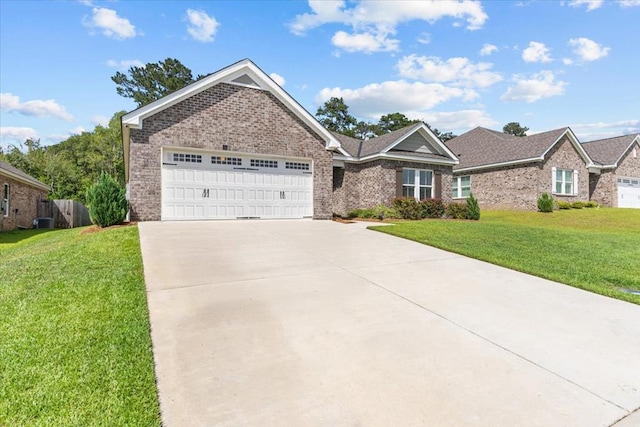 630 Ridgeland Rd, Dothan, AL 36301 - view of front facade featuring a garage, driveway, and brick siding