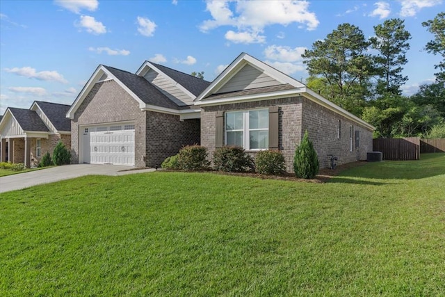 630 Ridgeland Rd, Dothan, AL 36301 - ranch-style house with brick siding, a garage, and concrete driveway