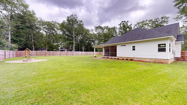 view of yard with a playground