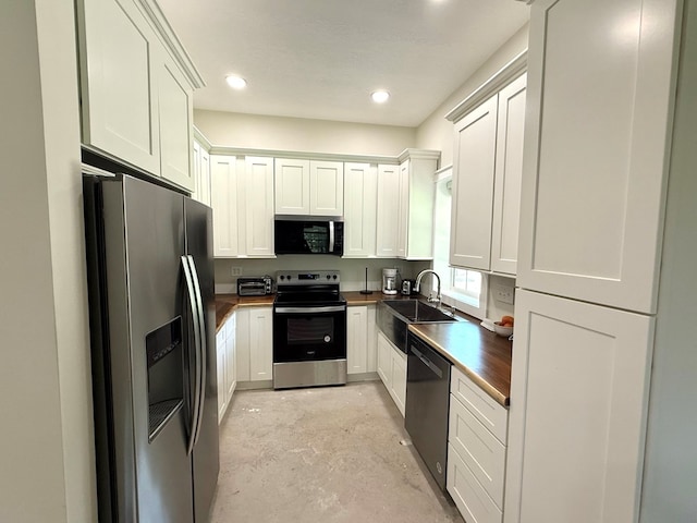 245 County Road 422, Abbeville, AL 36310 - kitchen featuring appliances with stainless steel finishes, concrete floors, white cabinets, and recessed lighting