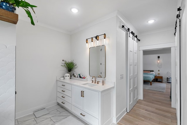 481 Grace Dr, Newton, AL 36352 - bathroom featuring vanity, crown molding, ensuite bathroom, recessed lighting, and baseboards