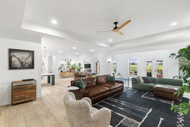 481 Grace Dr, Newton, AL 36352 - living area with arched walkways, a raised ceiling, ceiling fan, light wood-type flooring, and recessed lighting