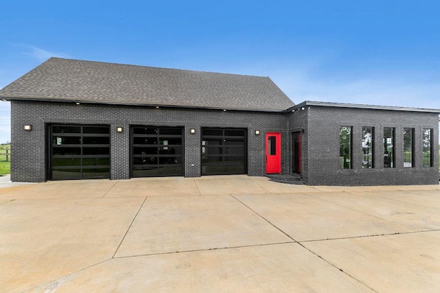 481 Grace Dr, Newton, AL 36352 - view of front of house with brick siding, driveway, and a garage