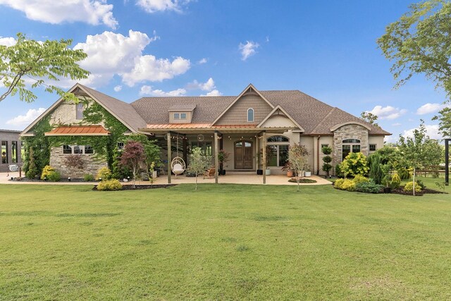 481 Grace Dr, Newton, AL 36352 - back of property with a yard, stone siding, and a patio