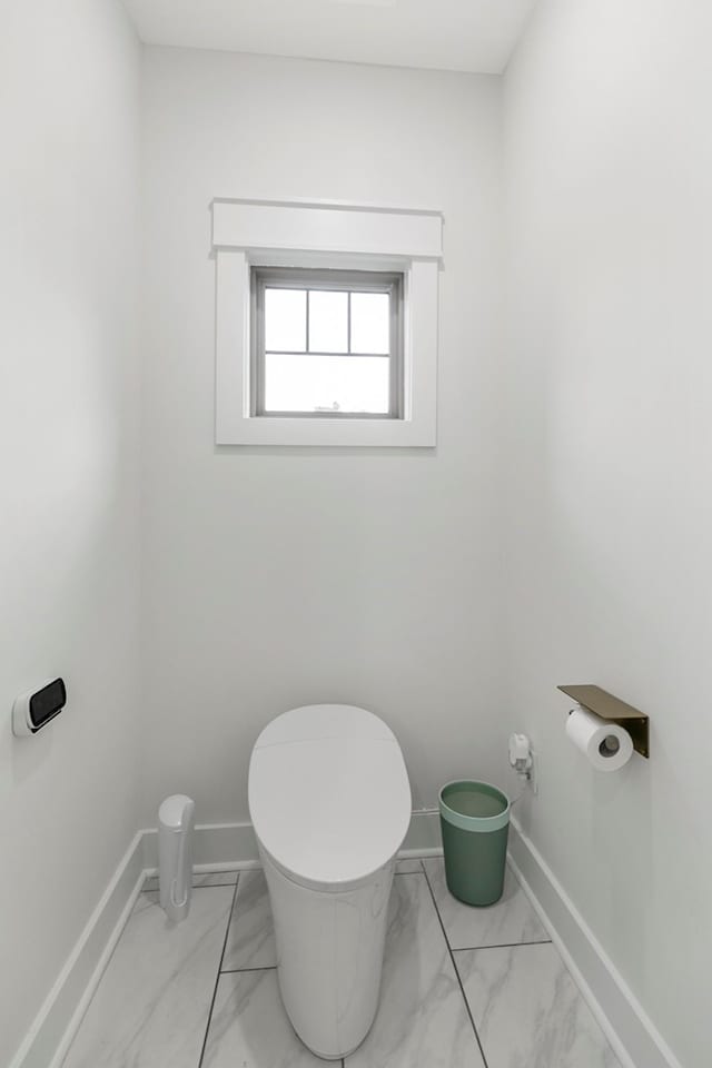 481 Grace Dr, Newton, AL 36352 - bathroom with marble finish floors, toilet, and baseboards
