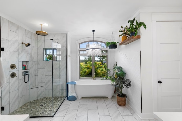 481 Grace Dr, Newton, AL 36352 - full bath featuring a freestanding bath, a stall shower, a chandelier, and crown molding