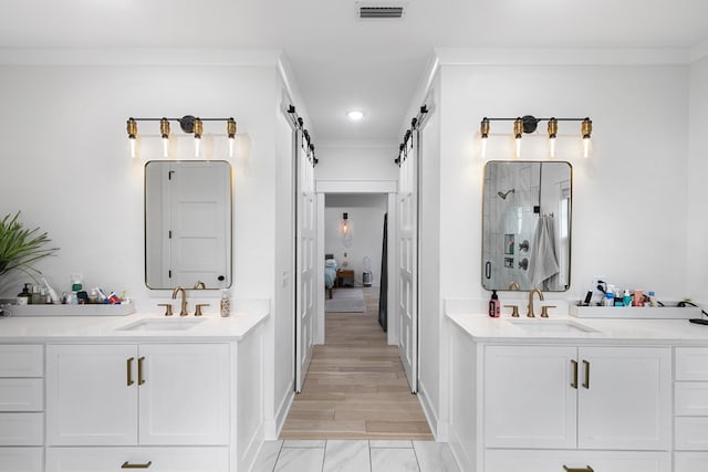 481 Grace Dr, Newton, AL 36352 - full bath featuring a stall shower, two vanities, ensuite bath, baseboards, and recessed lighting