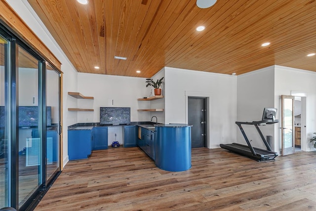 481 Grace Dr, Newton, AL 36352 - kitchen with open shelves, dark countertops, wood ceiling, blue cabinets, and ornamental molding