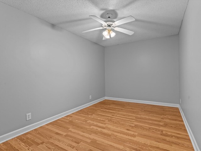 3602 Lake Oak Ridge Dr, Enterprise, AL 36330 - spare room featuring ceiling fan, light wood finished floors, a textured ceiling, and baseboards