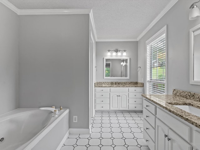 3602 Lake Oak Ridge Dr, Enterprise, AL 36330 - bathroom featuring tile patterned floors, two vanities, a textured ceiling, and a garden tub