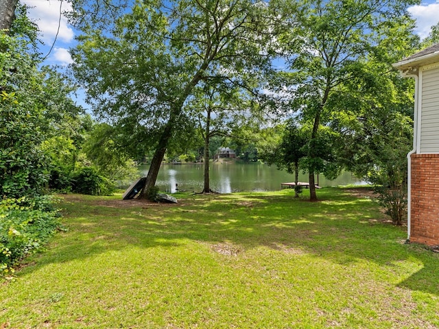 3602 Lake Oak Ridge Dr, Enterprise, AL 36330 - view of green lawn featuring a water view
