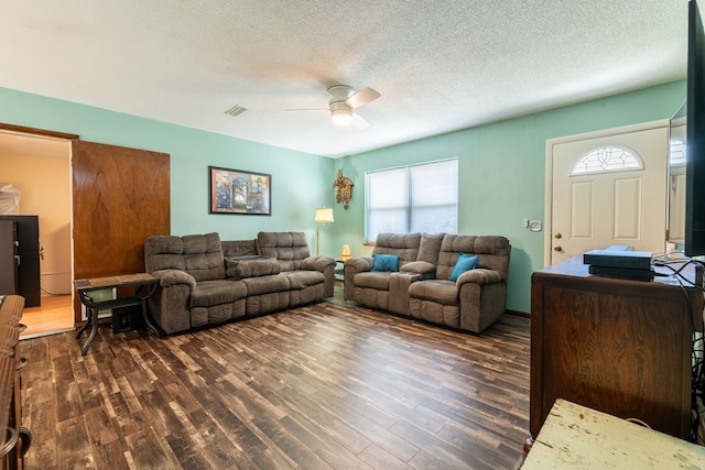 847 Phyllis Ave, Enterprise, AL 36330 - living area featuring dark wood-style floors, ceiling fan, and a textured ceiling