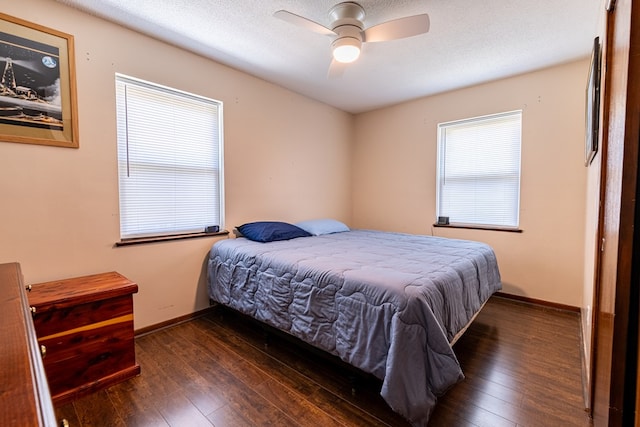 847 Phyllis Ave, Enterprise, AL 36330 - bedroom featuring wood-type flooring, baseboards, a ceiling fan, and a textured ceiling